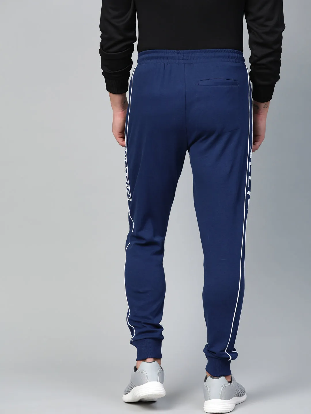 Alcis Men Navy Blue Solid Joggers with Side Striped Detail