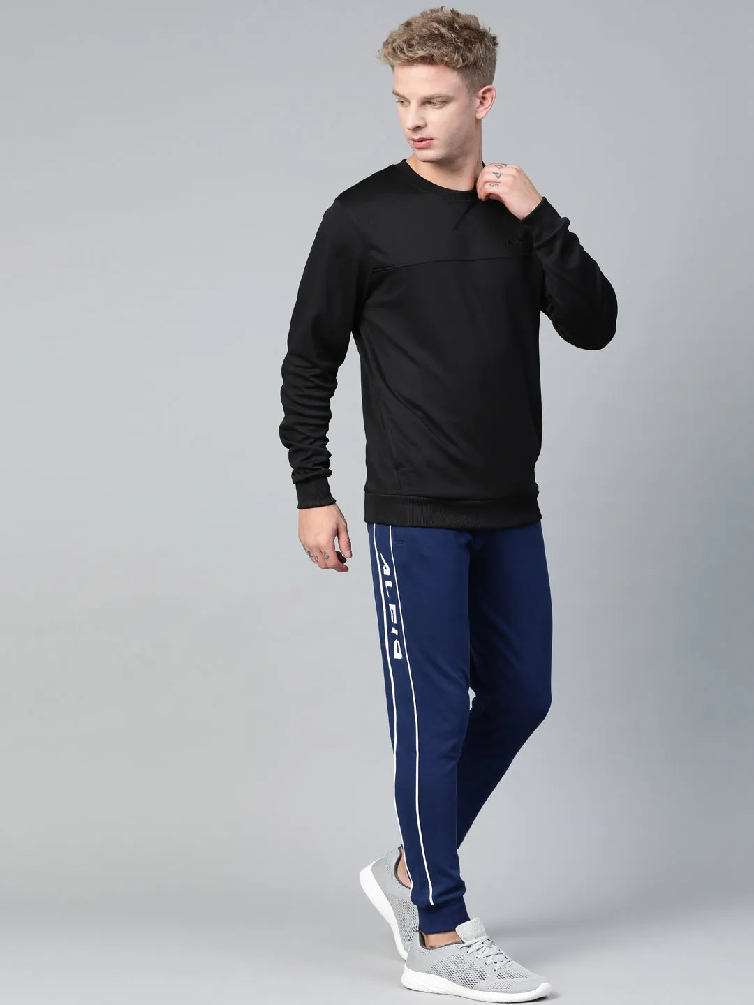 Alcis Men Navy Blue Solid Joggers with Side Striped Detail