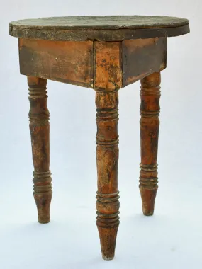 Small antique wooden side table with three legs