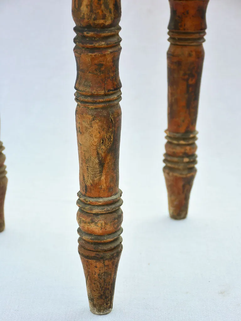 Small antique wooden side table with three legs